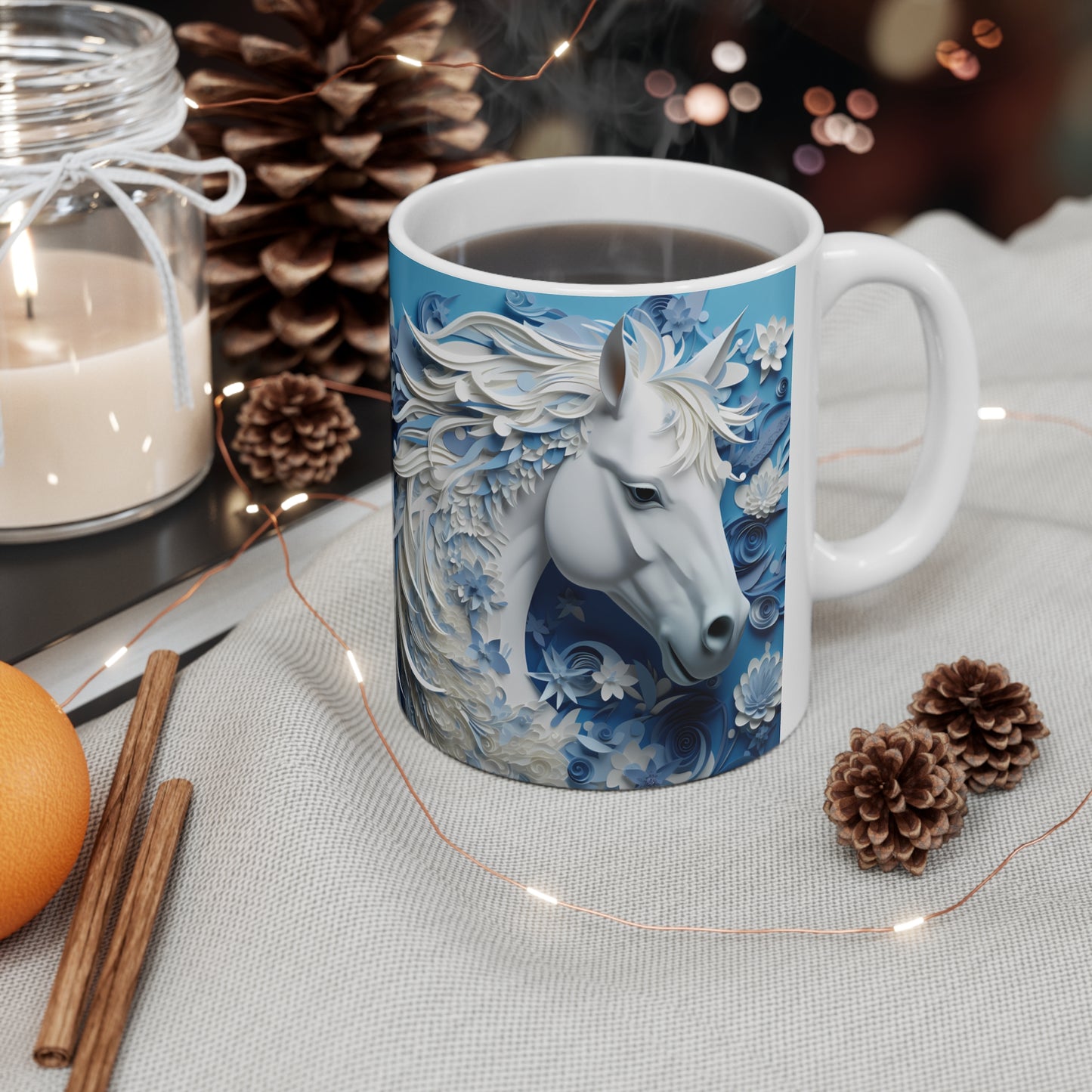 White ceramic mug featuring a sculpted-style white horse with flowing blue and white floral mane on a cool blue background. 11oz, microwave and dishwasher safe.