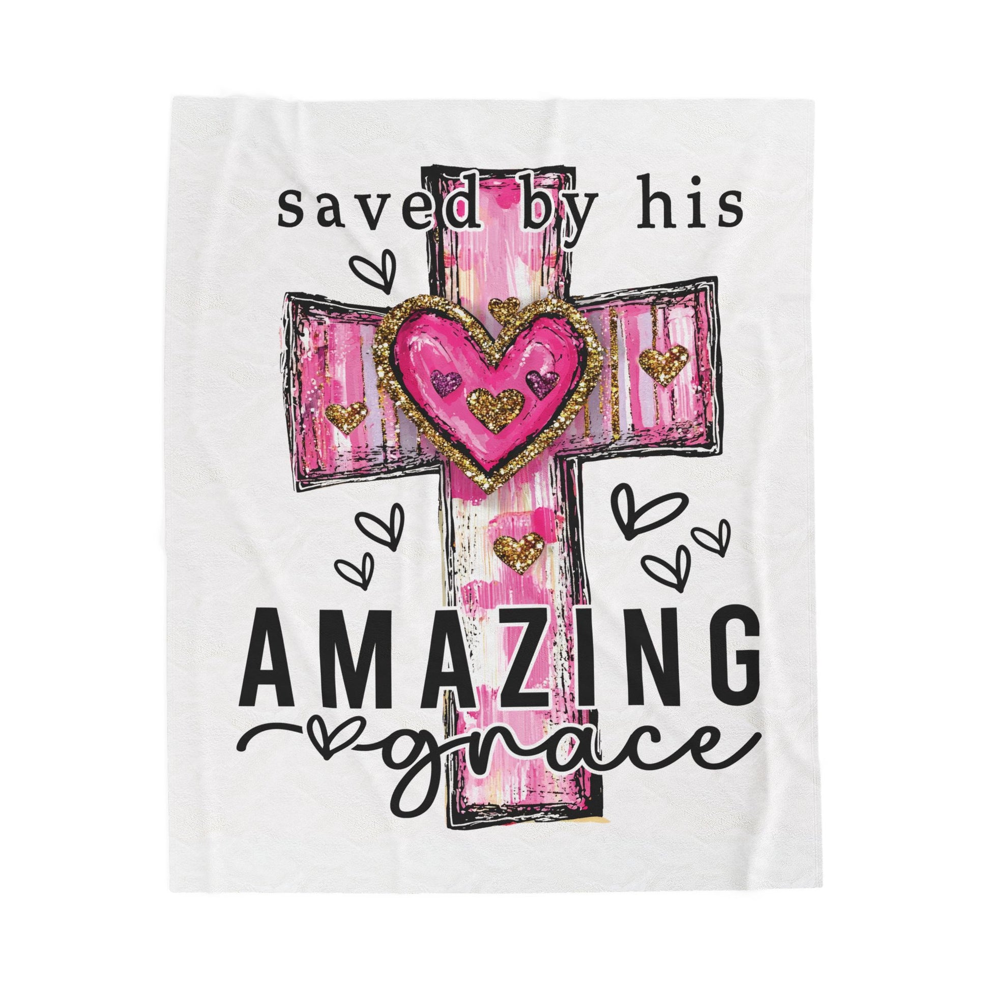 A blanket with a graphic design featuring a cross with a pink heart and the text 'saved by his AMAZING grace'