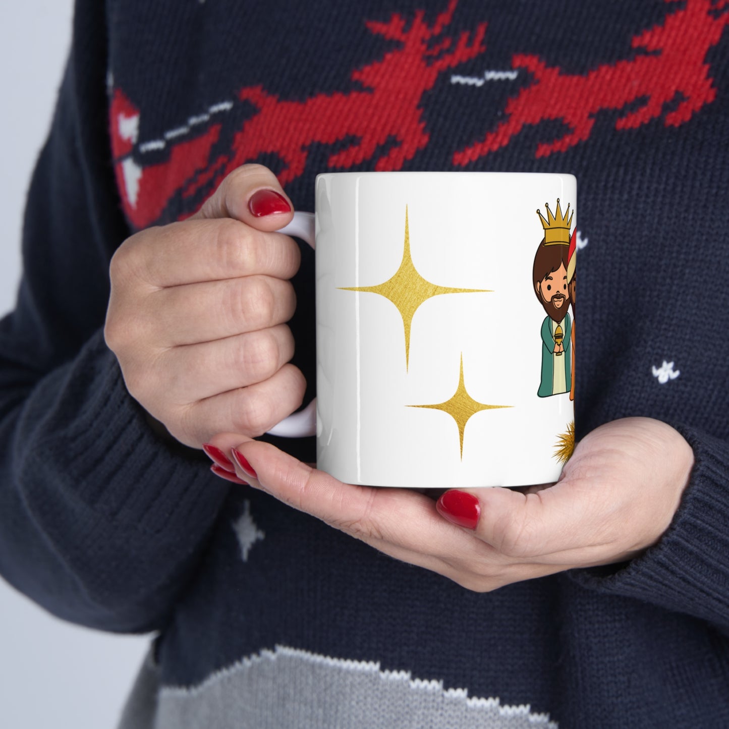 Cute Christmas mug with cartoon Three Kings and baby Jesus in manger