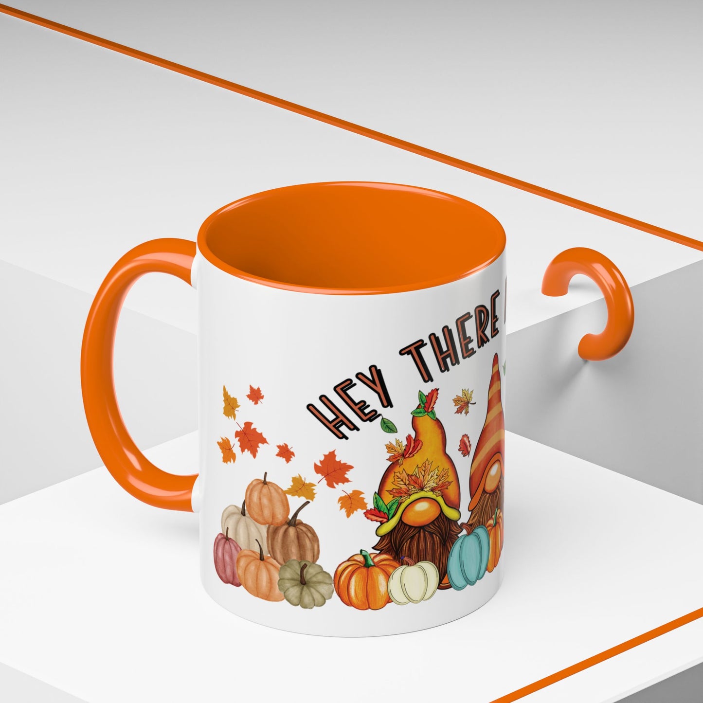 Hey There Pumpkin mug with three fall gnomes, colorful pumpkins, scattered autumn leaves, and vibrant seasonal design – 11oz ceramic by MUGSCITY23