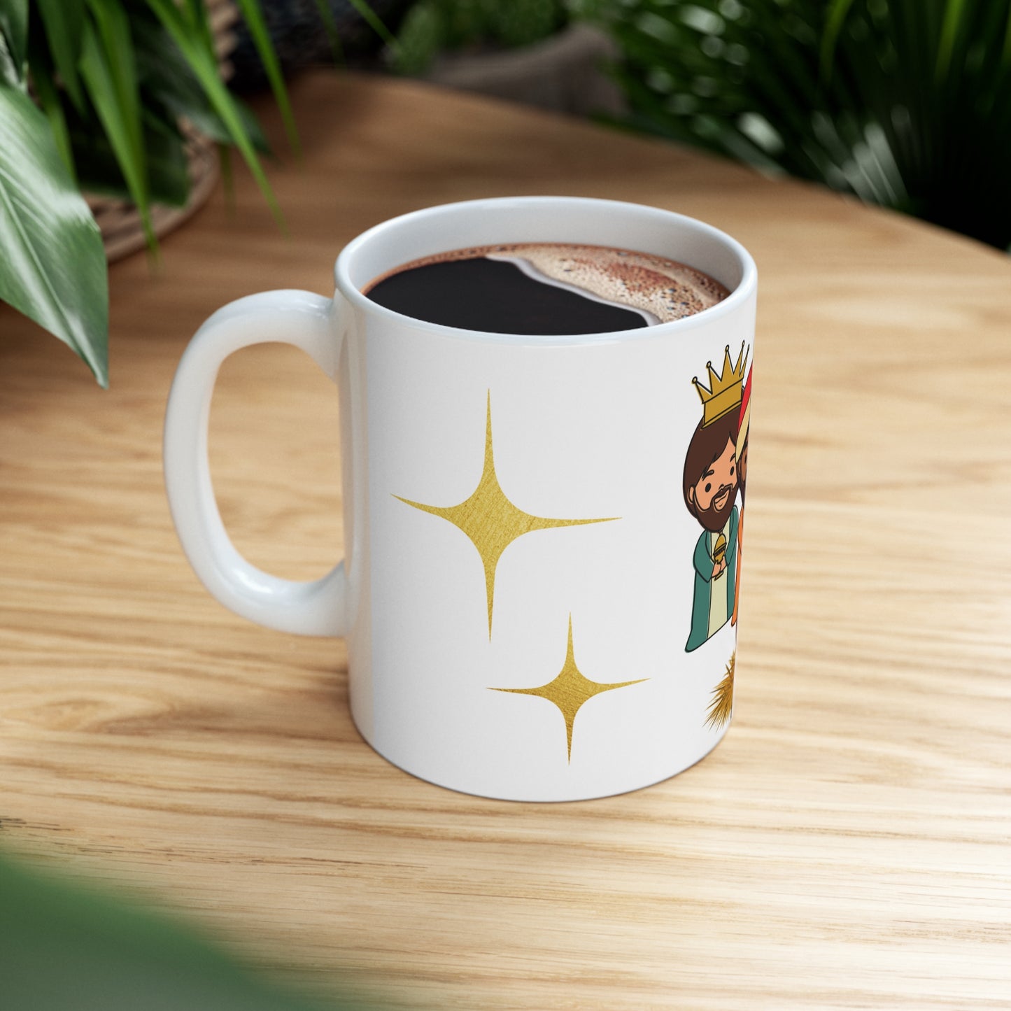 Cute Christmas mug with cartoon Three Kings and baby Jesus in manger