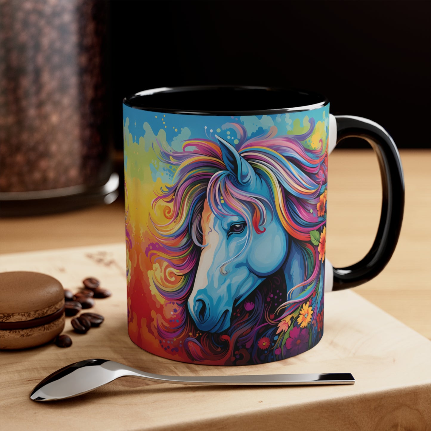 Bright ceramic mug featuring a blue horse with a multicolored rainbow mane, surrounded by flowers. Available in various accent colors. 11oz.