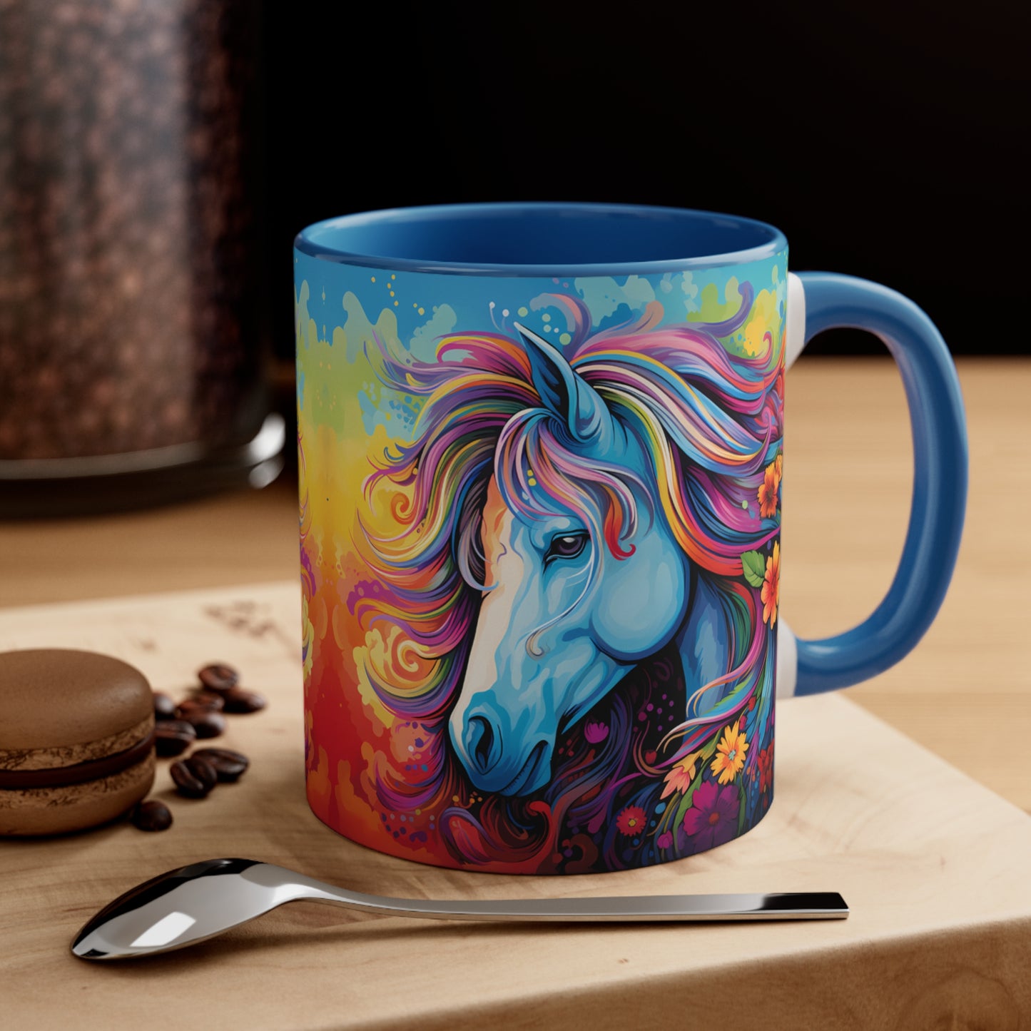 Bright ceramic mug featuring a blue horse with a multicolored rainbow mane, surrounded by flowers. Available in various accent colors. 11oz.