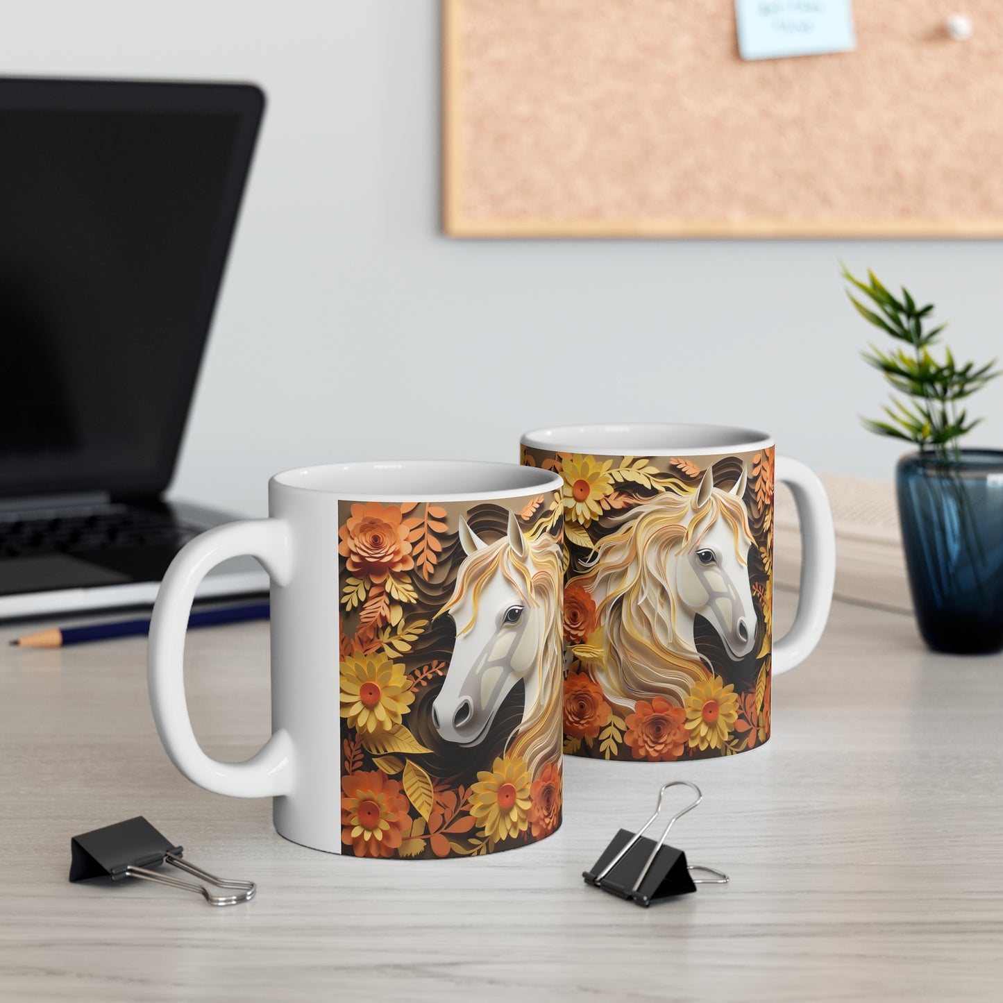 White ceramic mug featuring a sculpted-style white horse with golden mane surrounded by orange, yellow, and brown fall flowers and leaves. 11oz, microwave and dishwasher safe.