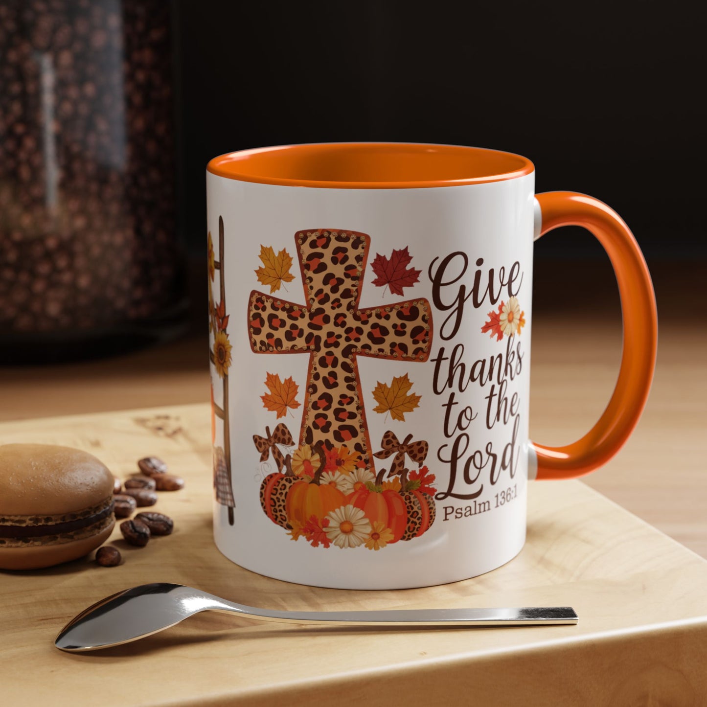 Christian fall mug with leopard cross, pumpkins, sunflowers, and Psalm 136:1 – Give thanks to the Lord – perfect Thanksgiving faith gift