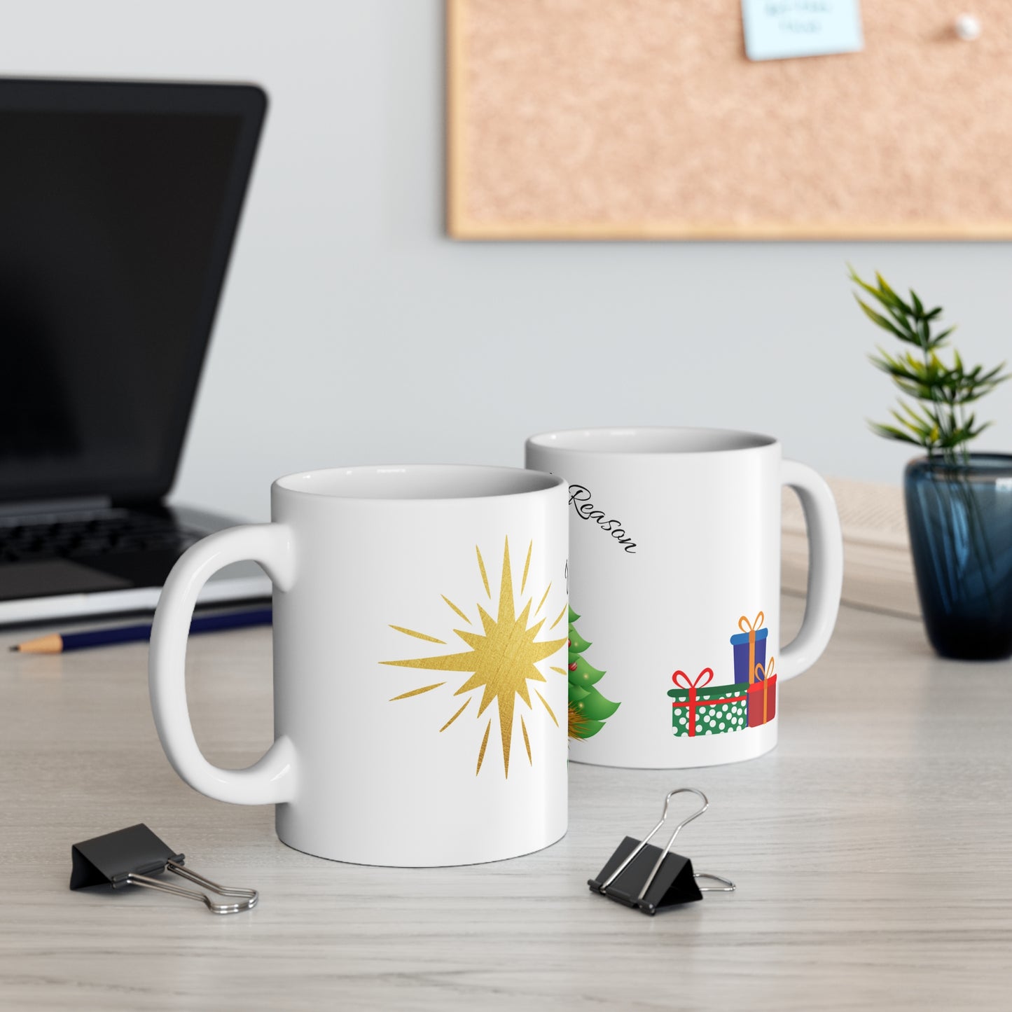 Christmas mug with baby Jesus, decorated tree, gifts, and “Jesus is the Reason” text