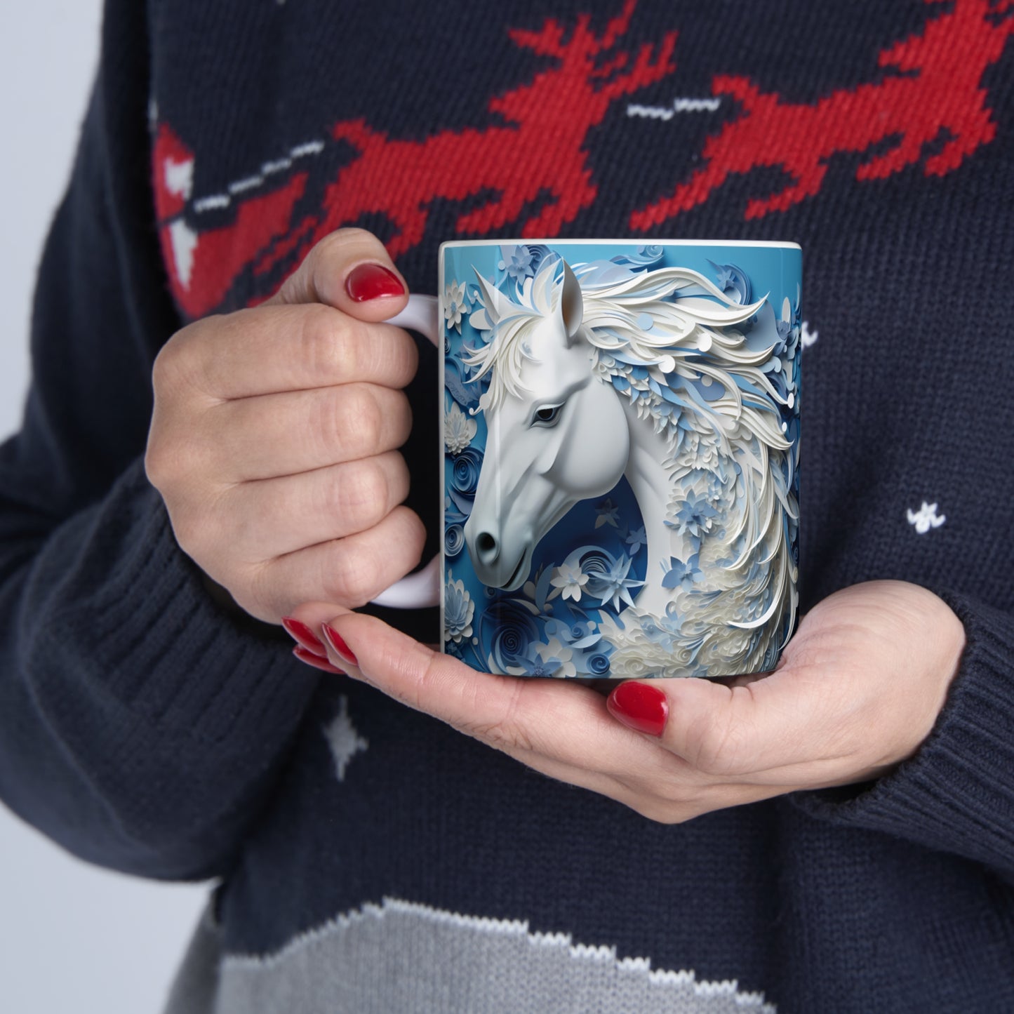 White ceramic mug featuring a sculpted-style white horse with flowing blue and white floral mane on a cool blue background. 11oz, microwave and dishwasher safe.
