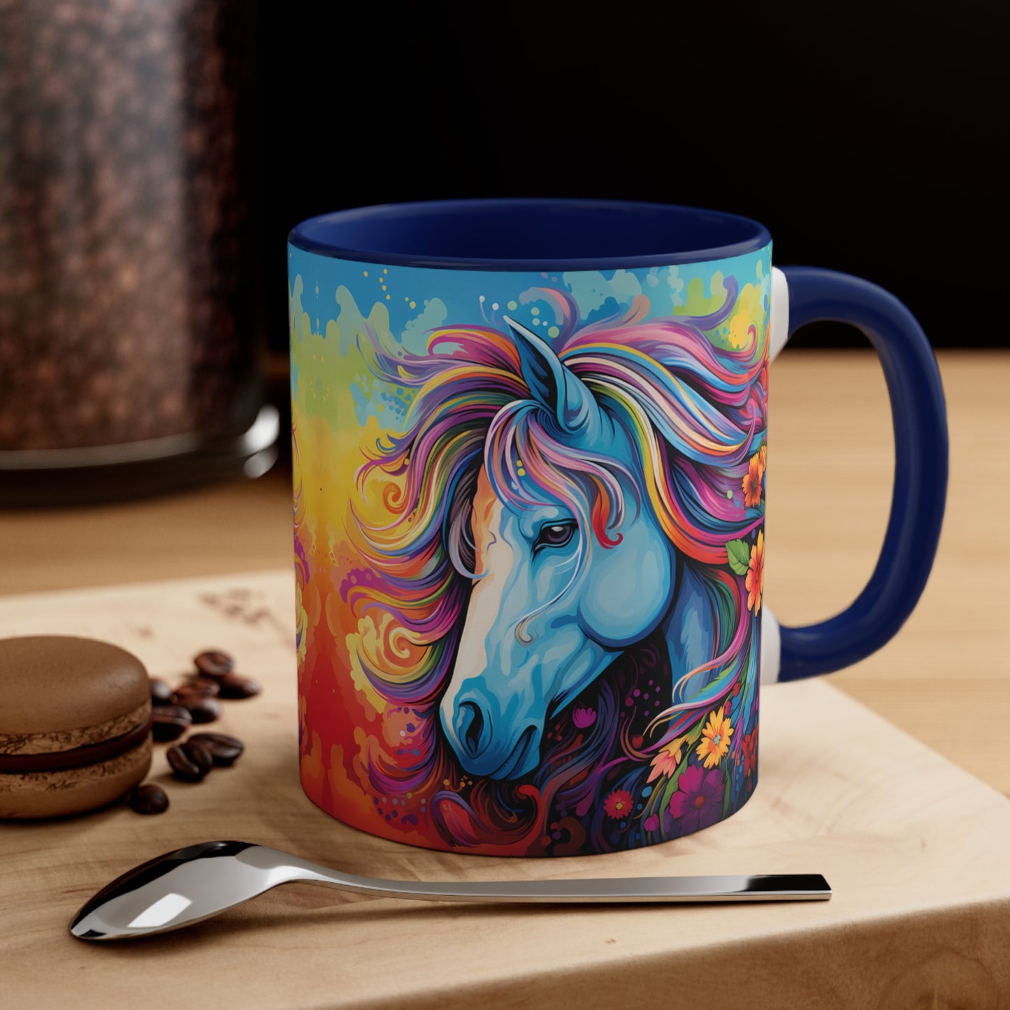 Bright ceramic mug featuring a blue horse with a multicolored rainbow mane, surrounded by flowers. Available in various accent colors. 11oz.