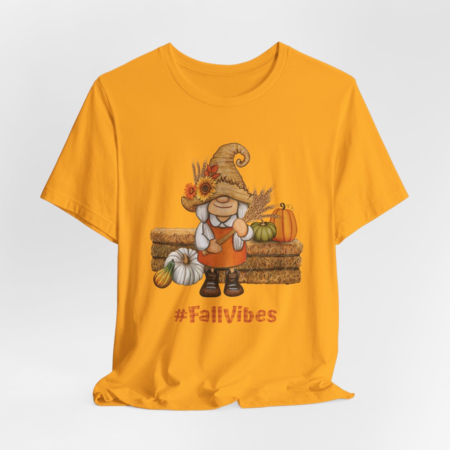 Cute Fall Gnome Shirt with pumpkins, sunflowers, and #FallVibes on soft gold color T-shirt – autumn season design