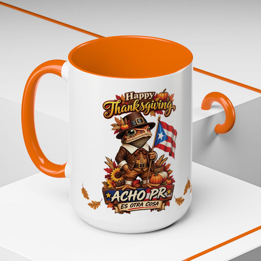 A white ceramic coffee mug with a bright orange handle and interior, featuring a Thanksgiving-themed cartoon turkey graphic with the text 'Happy Thanksgiving' and 'ACHO PR ES OTRA COSA'.